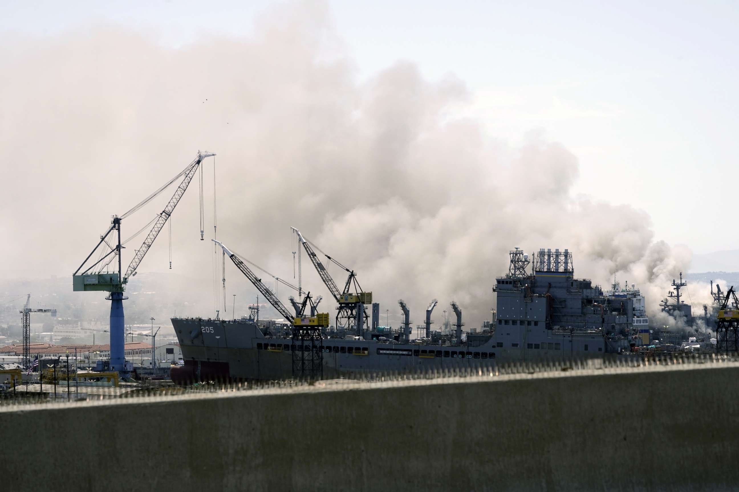 PHOTO: Smoke rises from a fire on board the U.S. Navy amphibious assault ship USS Bonhomme Richard at Naval Base San Diego, Calif., July 12, 2020.