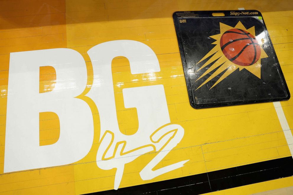 PHOTO: A decal honoring WNBA player Brittney Griner is displayed on the court before Game Five of the Western Conference Second Round NBA Playoffs between the Phoenix Suns and the Dallas Mavericks at Footprint Center, on May 10, 2022, in Phoenix, Ariz.