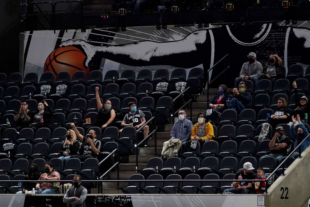 PHOTO: Fans return to the AT&T Center in a limited capacity for an NBA basketball game between the San Antonio Spurs and the Oklahoma City Thunder in San Antonio, March 4, 2021.