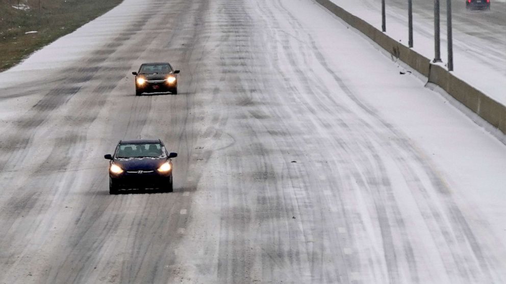 PHOTO: Drivers navigate hazardous road conditions as a winter storm moves through the area near Hillsborough, N.C., Jan. 16, 2022. 