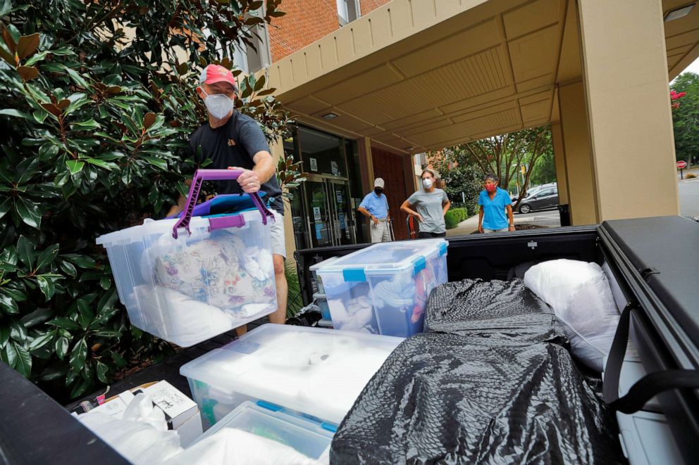 PHOTO: Students comply with a requirement by the University of North Carolina to move out of campus housing due to the coronavirus disease (COVID-19) outbreak in Chapel Hill, North Carolina, Aug. 30, 2020.