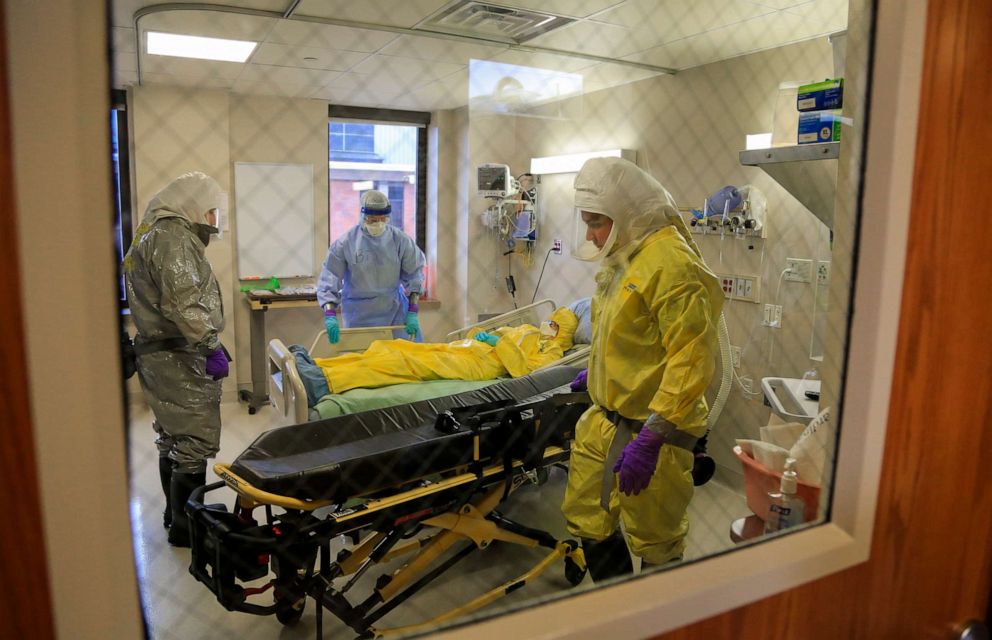 PHOTO: A mock-patient is tended to at the isolation unit at the Nebraska Medical Center in Omaha, Neb., April 12, 2017, during a training exercise.