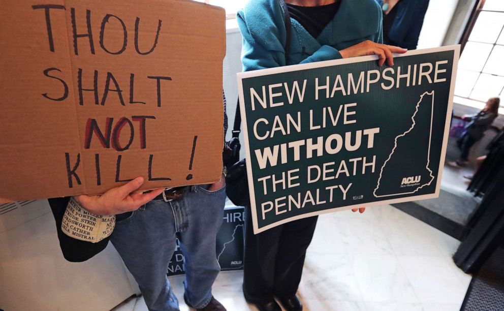 PHOTO: Protesters gather outside the Senate Chamber prior to a vote on the death penalty at the State House in Concord, N.H., Thursday, May 30, 2019.