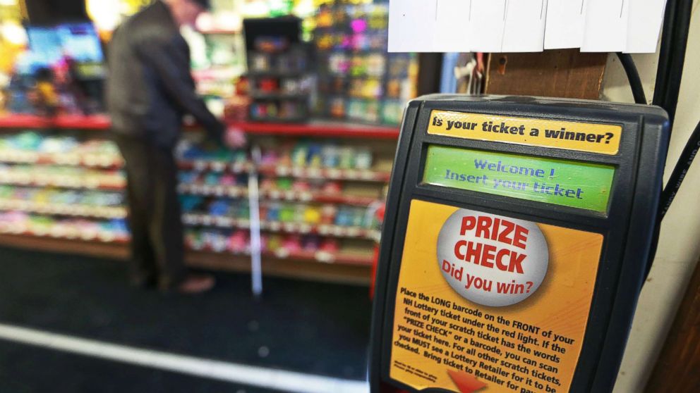 PHOTO: A ticket checking machine is pictured inside Reeds Ferry Market in Merrimack, NH, where a winning ticket in a $560 million Powerball jackpot was sold, Jan. 8, 2018.