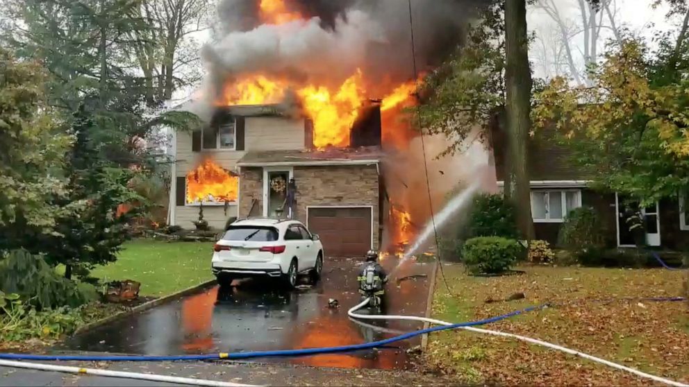 PHOTO: A house is seen on fire after a plane crashed into it in Colonia, New Jersey, Oct. 29, 2019.