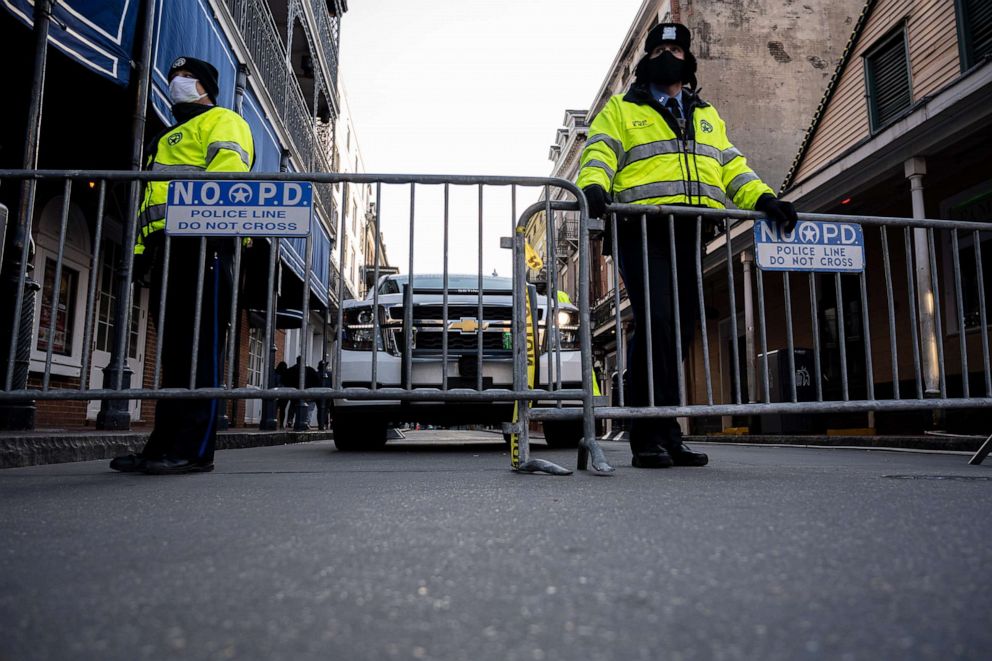 PHOTO: A pair of New Orleans Police Department officers guard a barricade on Bourbon Street, Feb. 16, 2021, in New Orleans.