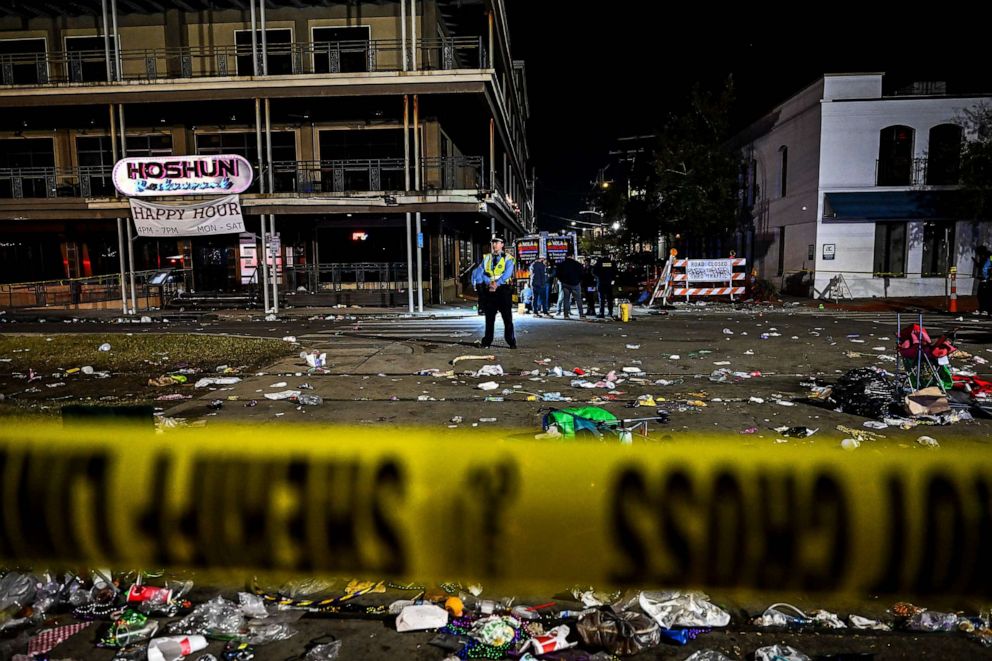 PHOTO: Police officers work at the scene of a shooting that occurred during the Krewe of Bacchus parade in New Orleans, Feb. 19, 2023.