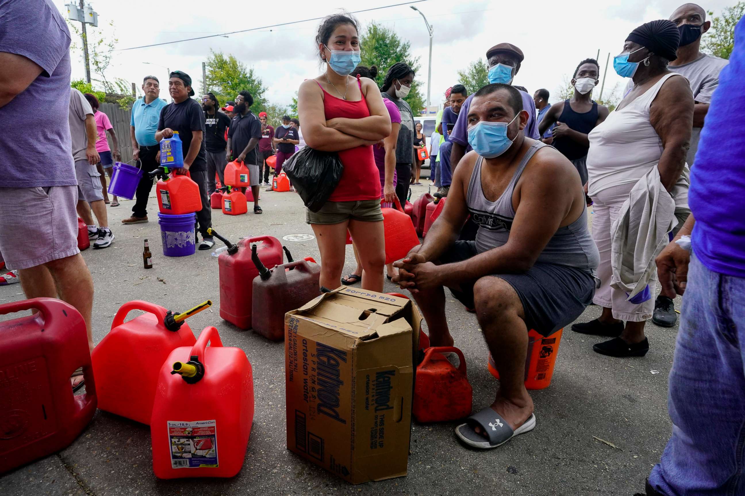 PHOTO: In the aftermath of Hurricane Ida, people wait in line for gas, Aug. 31, 2021, in New Orleans, La.