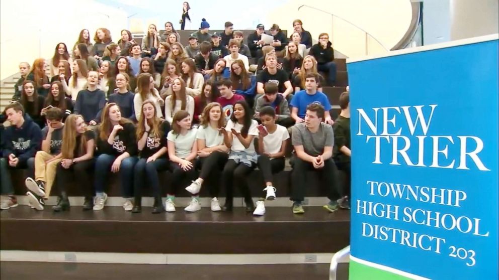 PHOTO: Students poses for a group photo in this image captured from video.