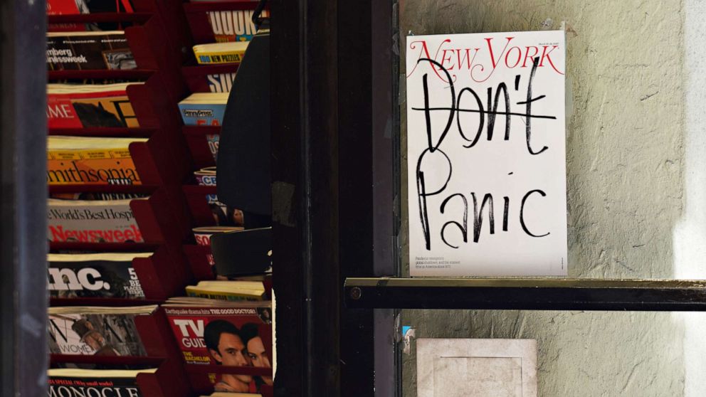 PHOTO: NEW YORK, - MARCH 15: A New York Magazine cover reading 'Don't Panic' is displayed on the door of a magazine shop as the coronavirus continues to spread across the United States on March 15, 2020 in New York City. 