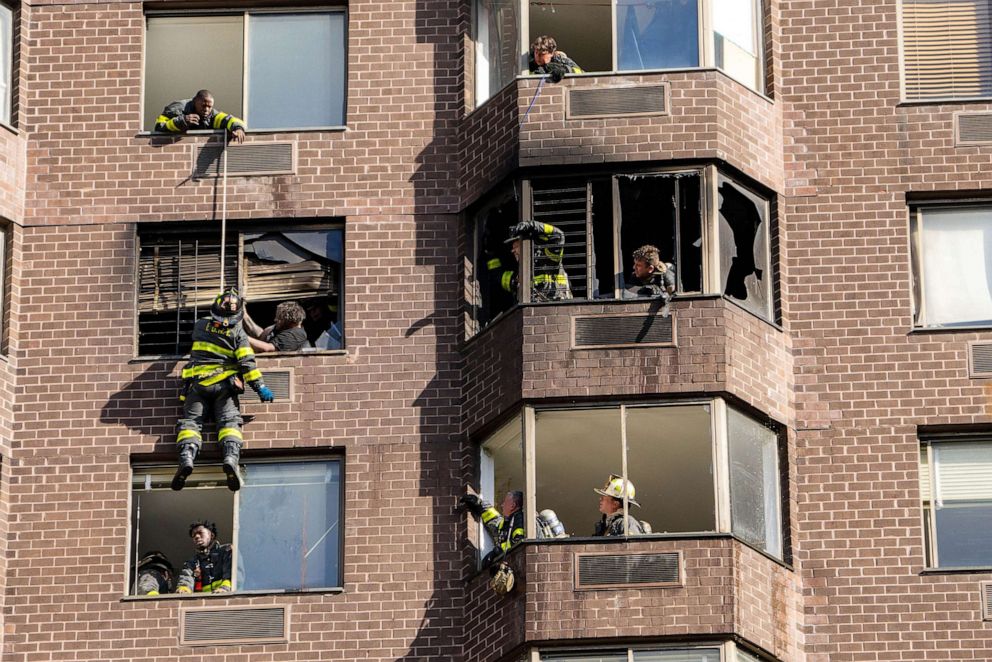 PHOTO: In this Nov. 5, 2022, file photo, firefighters perform a rope rescue after a fire broke out inside a high-rise building on East 52nd Street in New York.