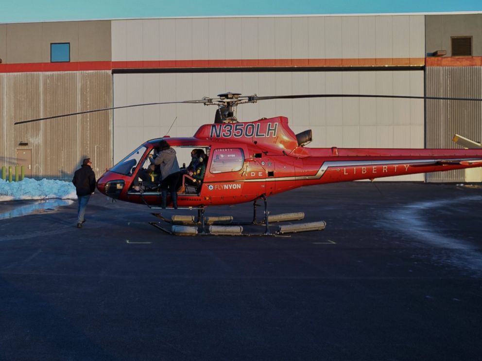 PHOTO: Passengers load into a chartered helicopter that later crashed into the East River in New York, March 11, 2018.