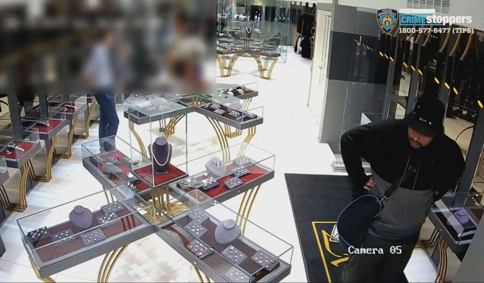 PHOTO: An image made from surveillance footage released by the New York Police Department shows three men robbing a jewelry store in Midtown Manhattan on Sunday, Aug. 25, 2019.