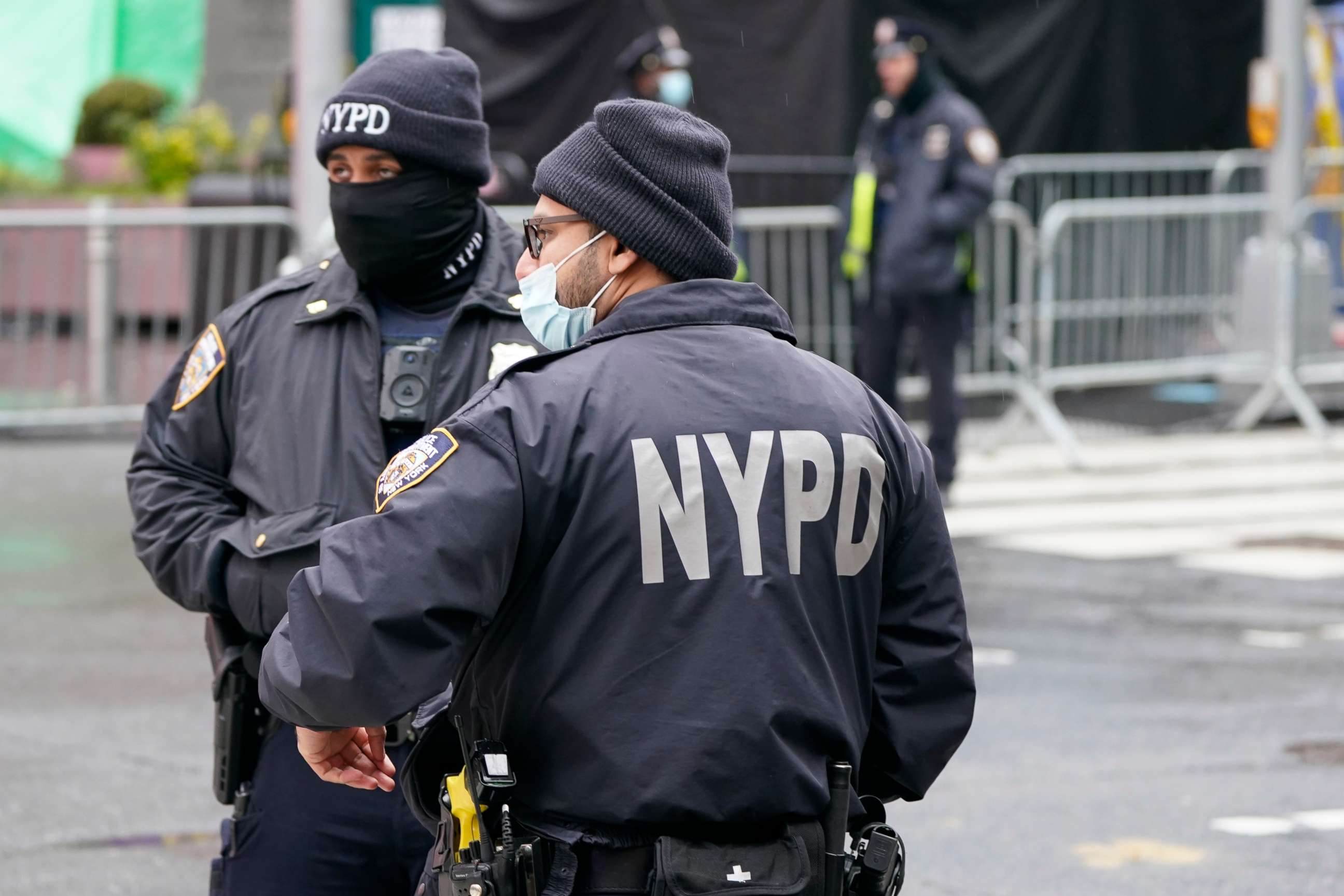 PHOTO: New York Police officers wear protective masks during the coronavirus pandemic in Times Square, Dec. 31, 2020, in New York.