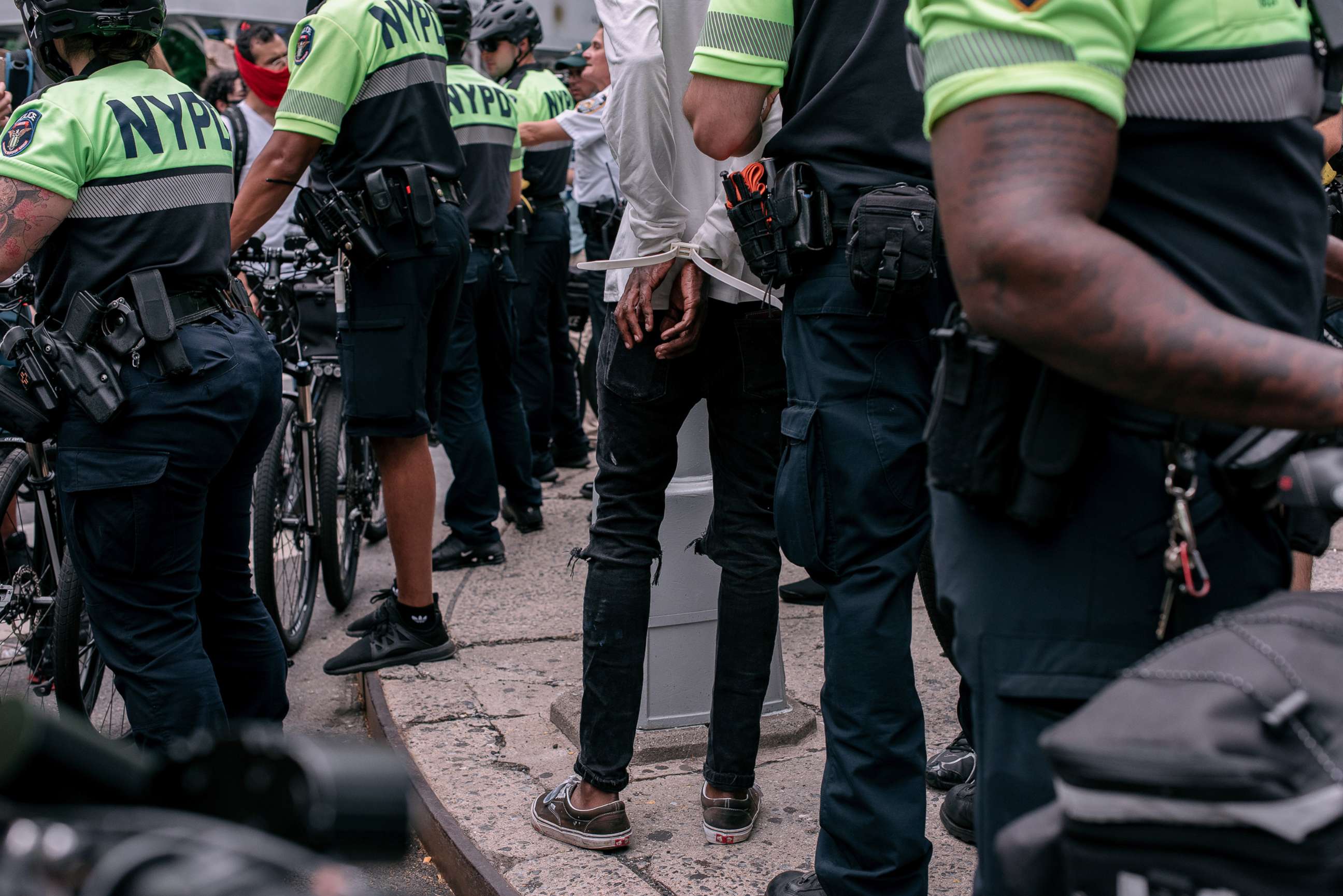 PHOTO: A protester is arrested by NYPD officers during a march against police brutality on June 11, 2020, in New York.