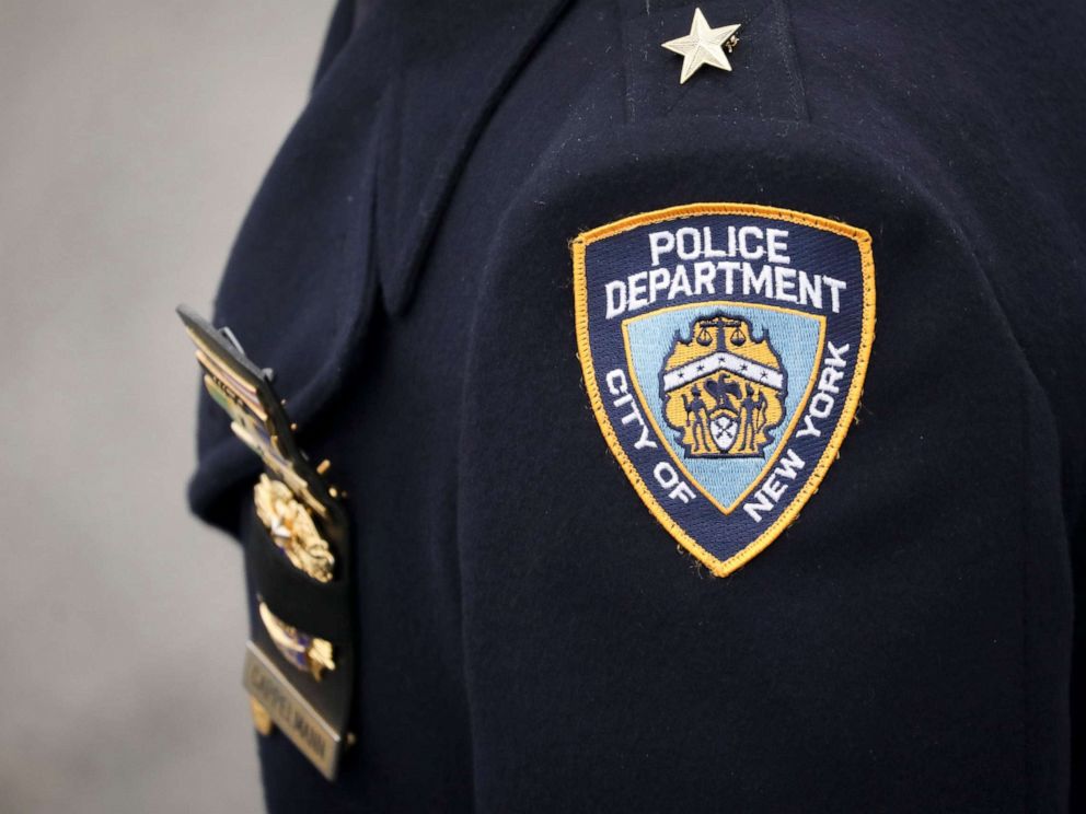 PHOTO: An NYPD officer arrives for the funeral service of fallen NYPD Detective Brian Simonsen at the Church of St. Rosalie, Feb. 20, 2019, in Hampton Bays, New York.