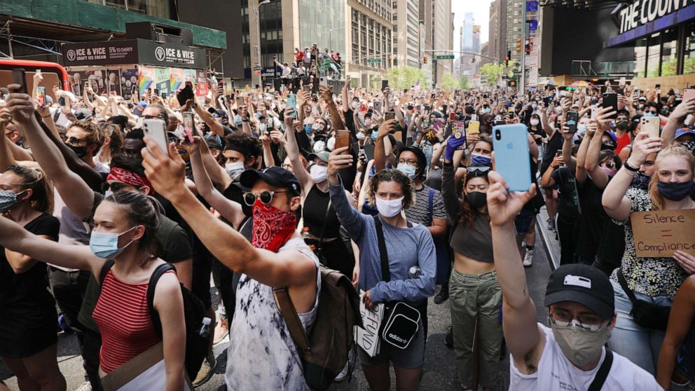 PHOTO: Hundreds of protesters march in Manhattan over the death on May 25 of black man George Floyd while in the custody of Minneapolis police, June 7, 2020, in New York.