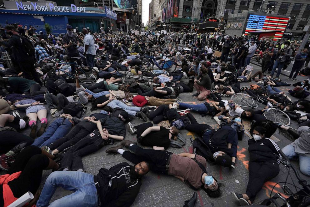 PHOTO: Protestors lay on the ground with their hands behind their back in a call for justice for George Floyd in Times Square on June 1, 2020, during a "Black Lives Matter" protest in New York.
