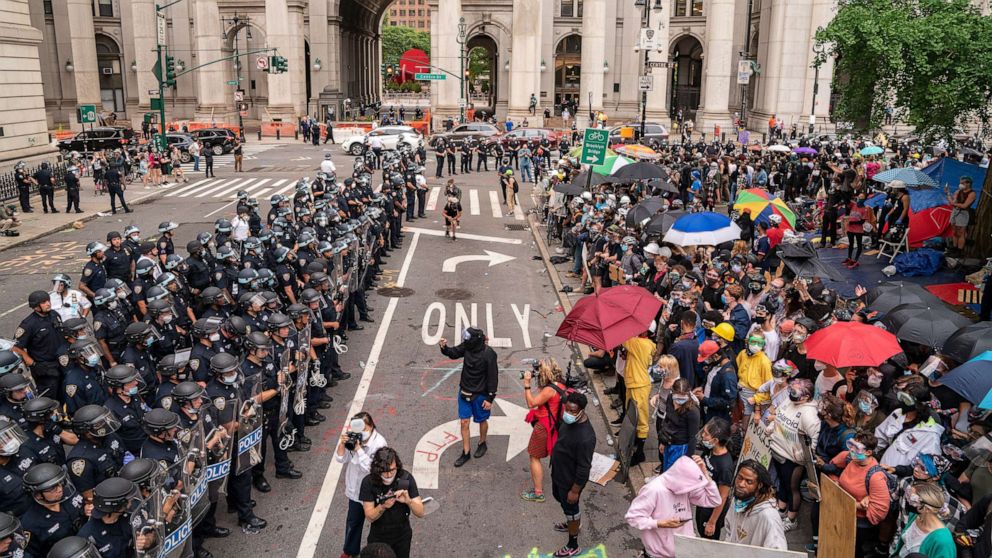 PHOTO: Police officers confront protesters on July 1, 2020, in New York.