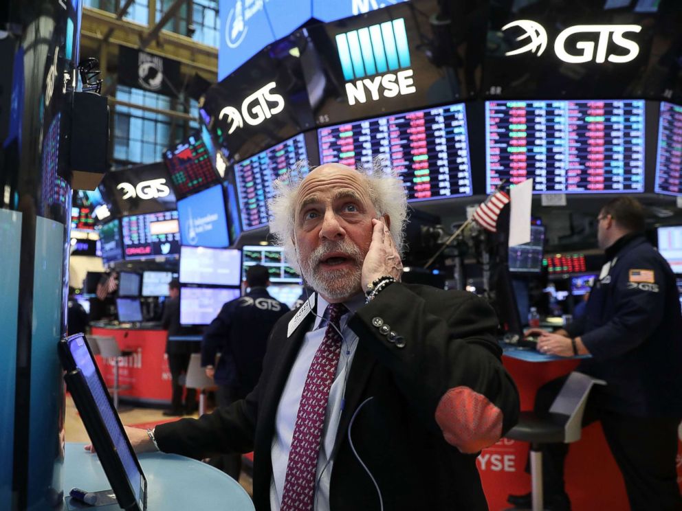 PHOTO: Traders work on the floor of the New York Stock Exchange moments before the closing bell on Feb. 8, 2018 in New York.