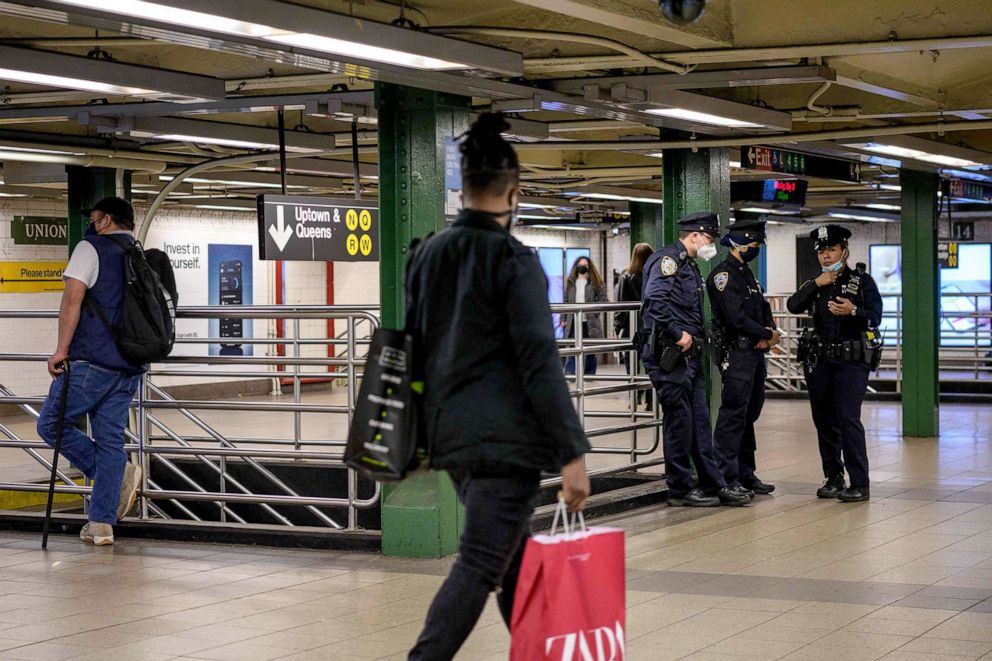 PHOTO: New York Police Officers stand at the Union Station subway stop in New York, May 10, 2021.