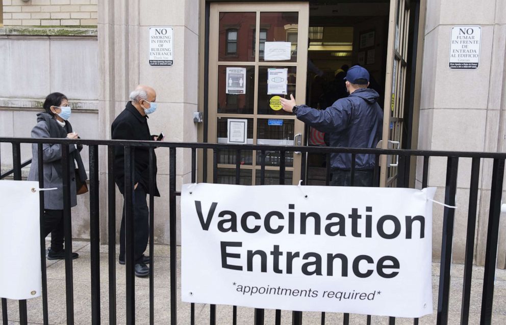 PHOTO: People enter a COVID-19 vaccine distribution site in New York, Jan. 22, 2021.