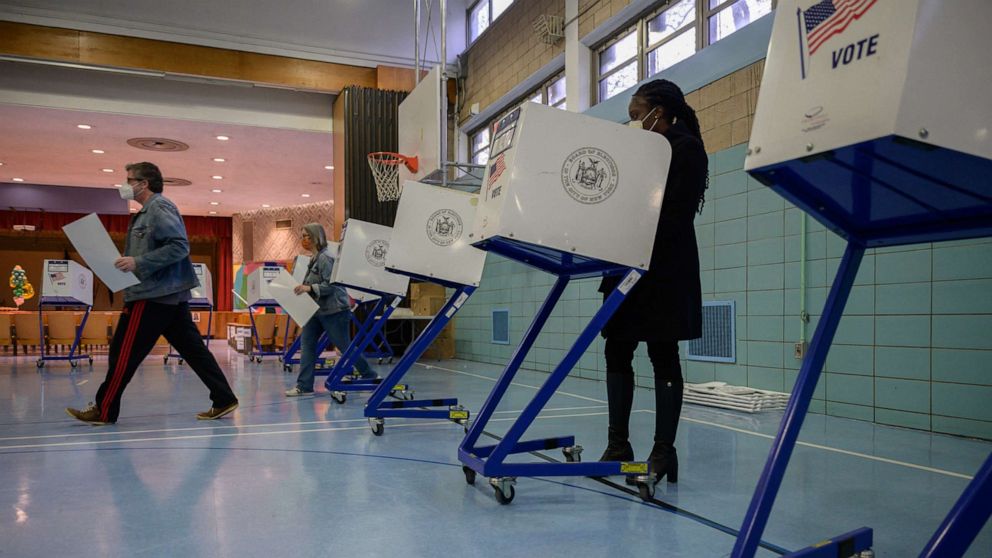 PHOTO: Voters cast their ballots at a voting center in Brooklyn, New York, Nov. 2, 2021. 