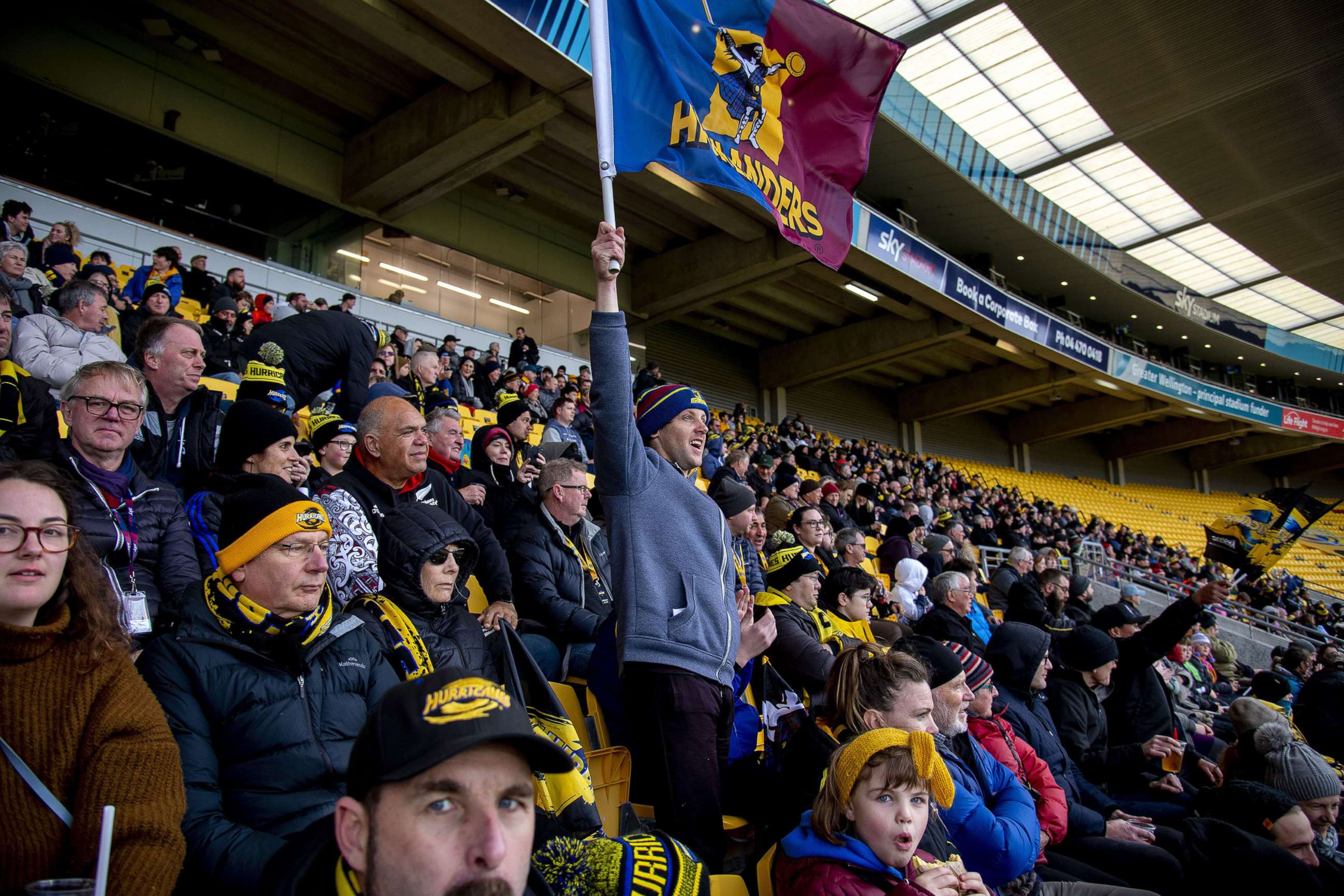 PHOTO: Fans in the grandstand watch the Super Rugby Aotearoa match between the Hurricanes and the Highlanders, at Sky Stadium, Wellington, New Zealand, July 12, 2020.