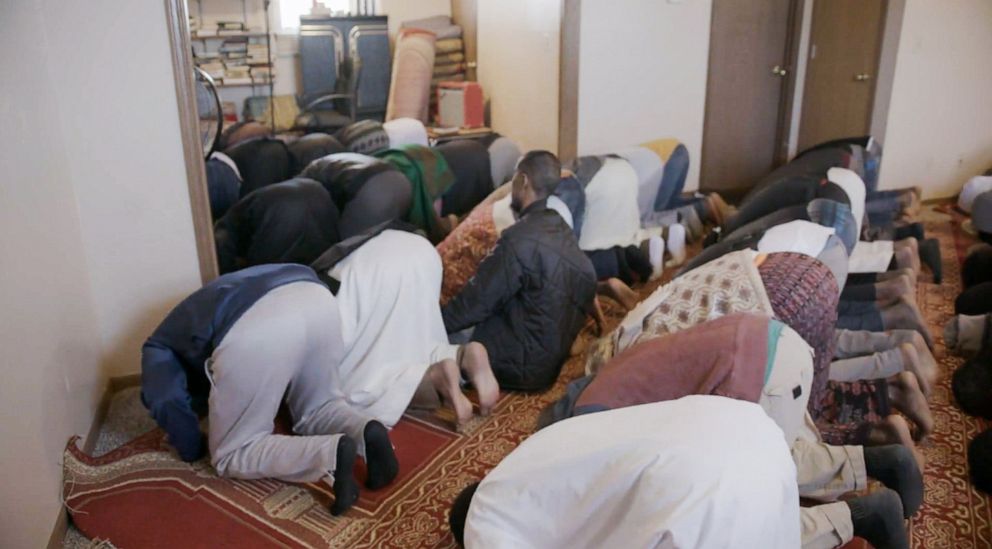 Worshippers pray inside the mosque at 312 West Mary Street in Garden City, Kansas, in October 2019.
