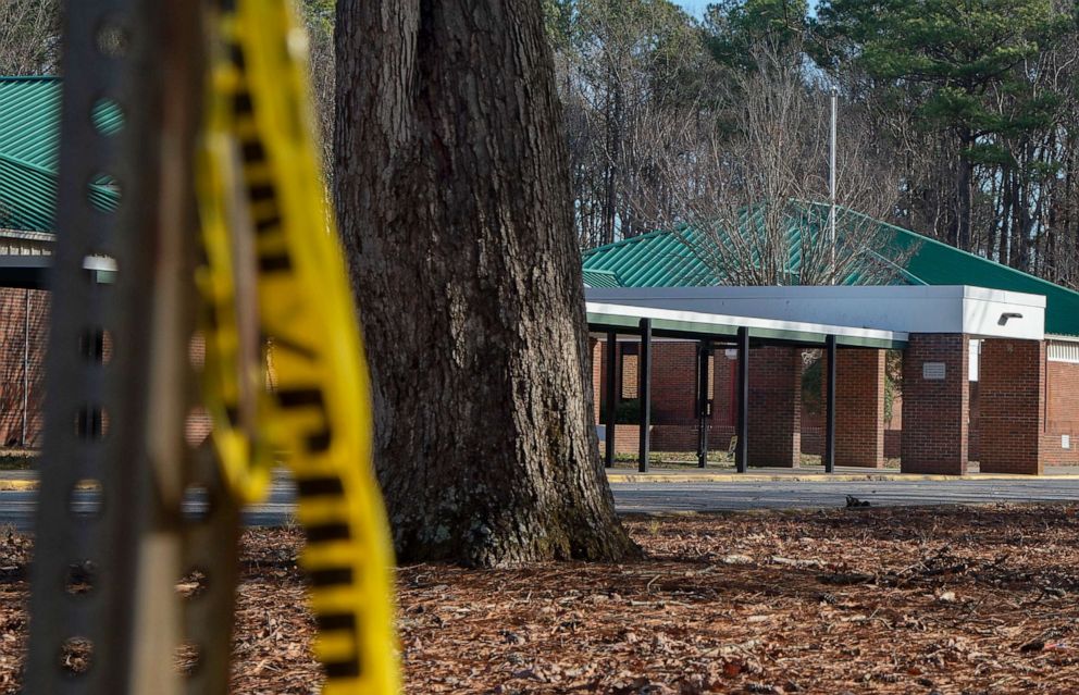 PHOTO: Police tape hangs from a sign post outside Richneck Elementary School, January 7, 2023, in Newport News, Virginia.