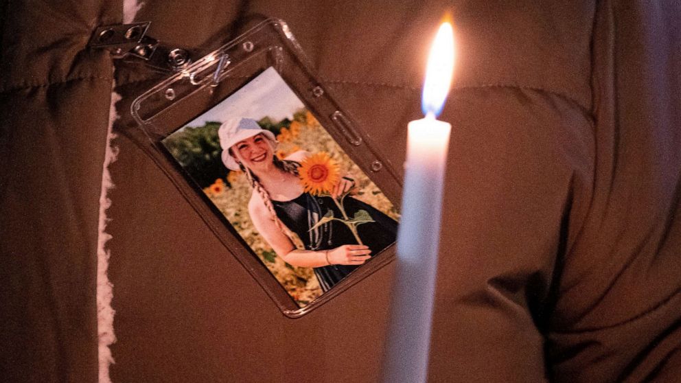 PHOTO: A photo of Abby Zwerner is pinned to a coat during a vigil for Abby Zwerner, the teacher shot by a 6-year-old student at Richneck Elementary, in front of the Newport News Public Schools Administration Building in January.