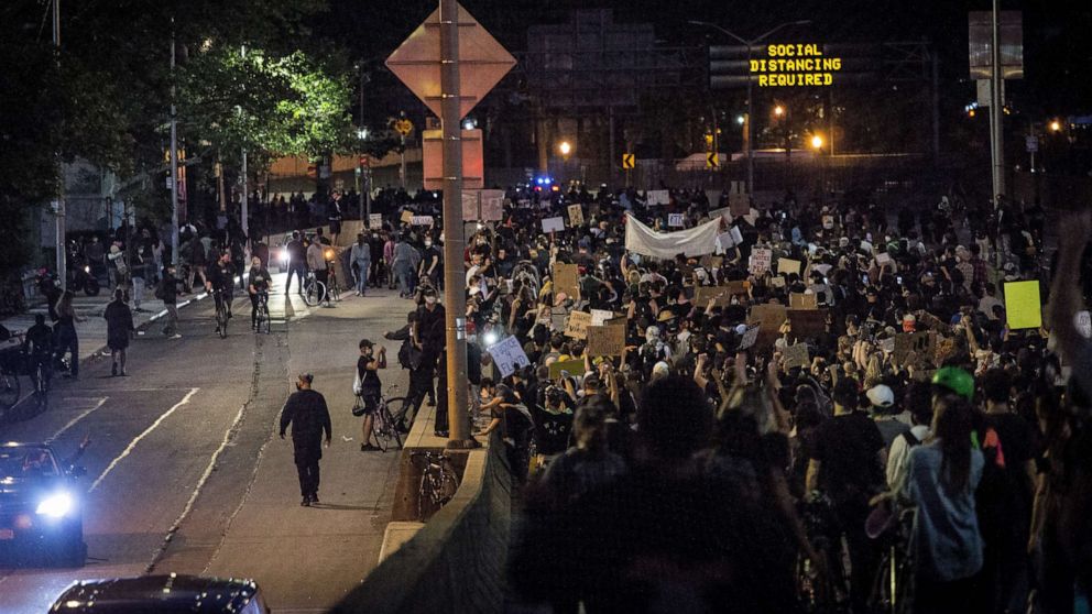 PHOTO: People cross the FDR Drive interrupting traffic during protests over the death of George Floyd, in New York, New York, June 1, 2020.