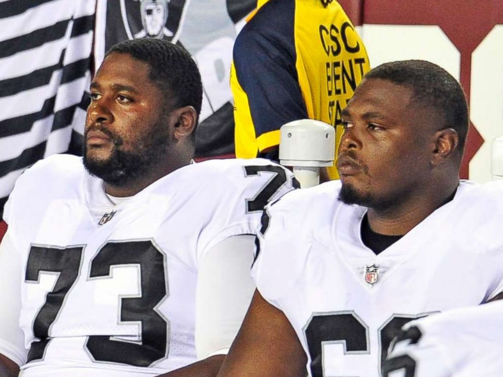 PHOTO: Oakland Raiders sit on the bench and stare straight ahead as the national anthem is sung prior to the game against the Washington Redskins at FedEx Field, Sept. 24, 2017,in Landover, Md. 
