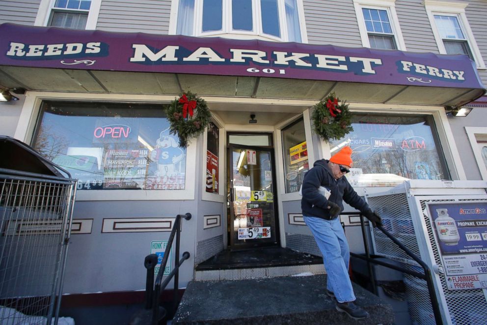 PHOTO: A customer departs Reeds Ferry Market convenience store, Jan. 7, 2018, in Merrimack, N.H. A lone Powerball ticket sold at this convenience store matched all six numbers and will claim a $570 million jackpot.