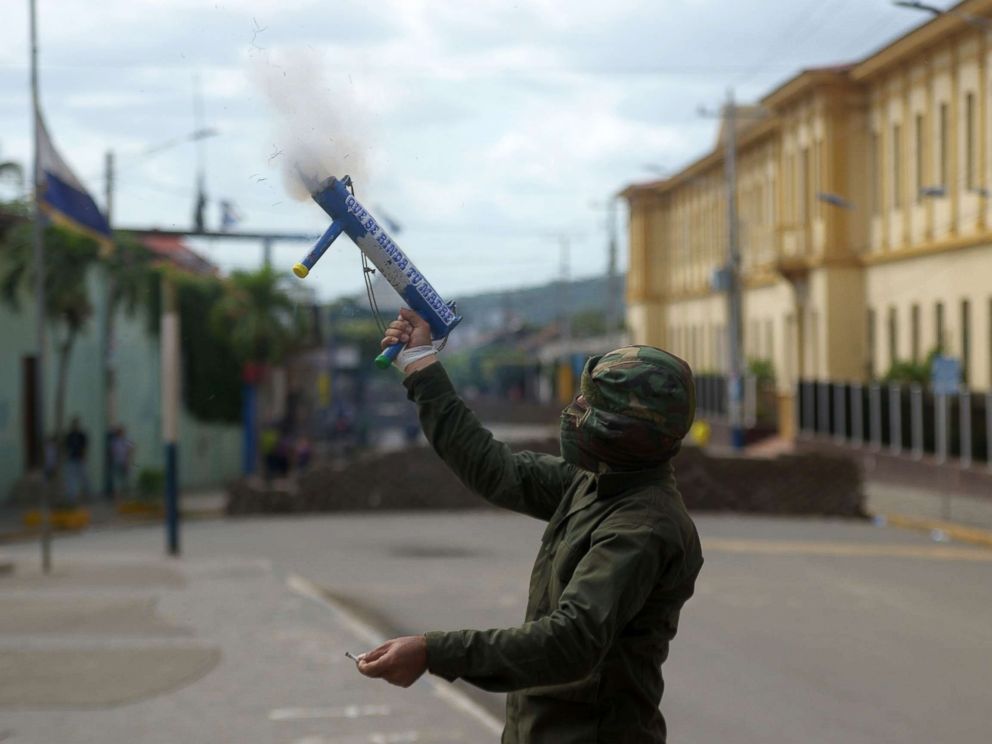 PHOTO: An anti-government demonstrator fires a homemade mortar in the Monimbo neighborhood in Masaya, Nicaragua, July 11, 2018.