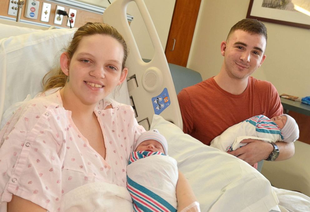 PHOTO: Marine Cpl. Nicholas Digregorio and wife Danielle hold their newborn twin girls (Sadie and Scarlett) at Naval Hospital Jacksonville, Sept. 14, 2018 in Jacksonville, Fla.