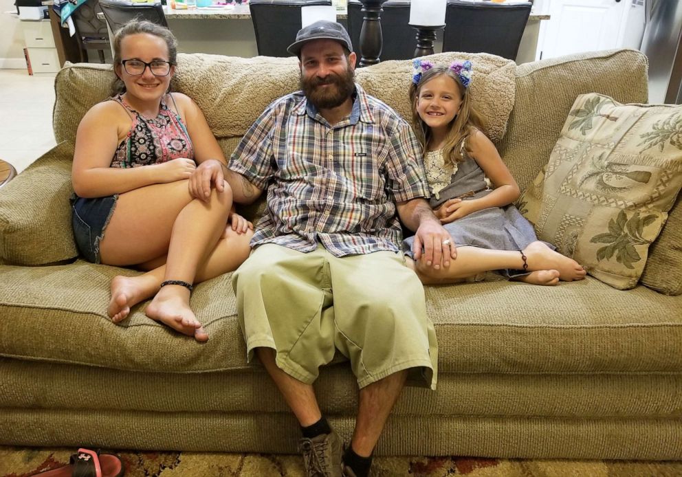 PHOTO:  Nicholas Farah poses in this undated photos with his daughters Ella and Elisha. His death in March 2019 was ruled a homicide caused by positional asphyxia when he was placed in a restraint chair at the Clark County Detention Center in Las Vegas.