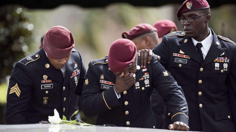 PHOTO: Members of the Special Forces cry at the tomb of Army Sgt. La David Johnson at his burial service in the Memorial Gardens East cemetery, Oct. 21, 2017 in Hollywood, Fla. Sgt. Johnson and three other U.S. soldiers were killed in an ambush in Niger.