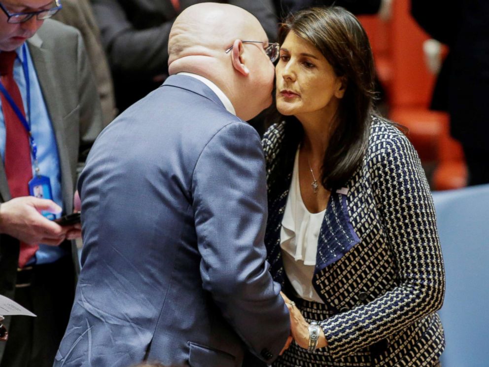 PHOTO: United States Ambassador to the United Nations Nikki Haley greets Russian Ambassador to the United Nations Vasily Nebenzya before the United Nations Security Council meeting on Syria at the U.N. headquarters in New York, April 13, 2018.
