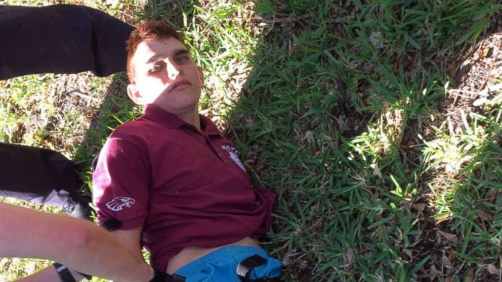 PHOTO: Nikolas Cruz is placed into handcuffs by police near Marjory Stoneman Douglas High School following a mass shooting in Parkland, Fla., Feb. 14, 2018.