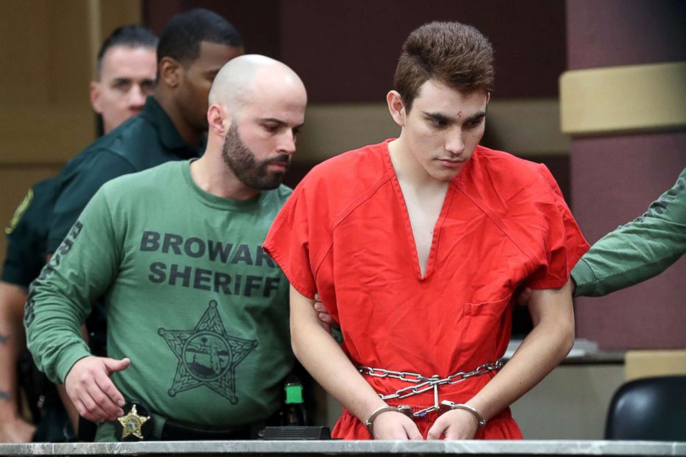 PHOTO: Nikolas Cruz is escorted into the courtroom for his arraignment at the Broward County Courthouse March 14, 2018 in in Fort Lauderdale, Fla.