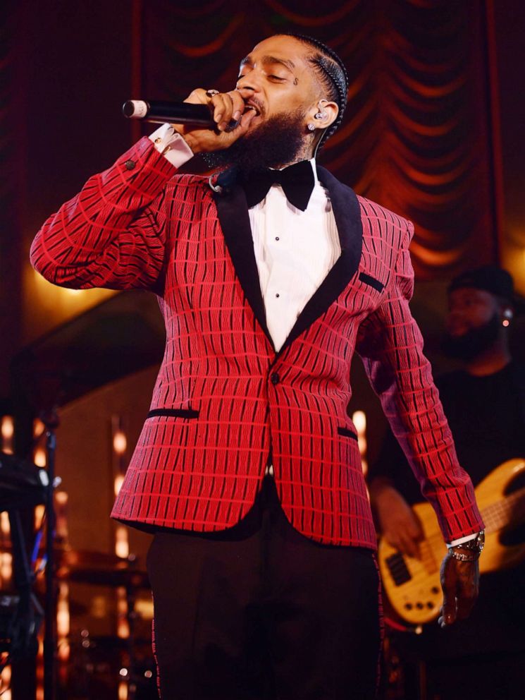 PHOTO: In this Feb. 7, 2019, file photo, Nipsey Hussle performs onstage at the Warner Music Pre-Grammy Party at the NoMad Hotel in Los Angeles.