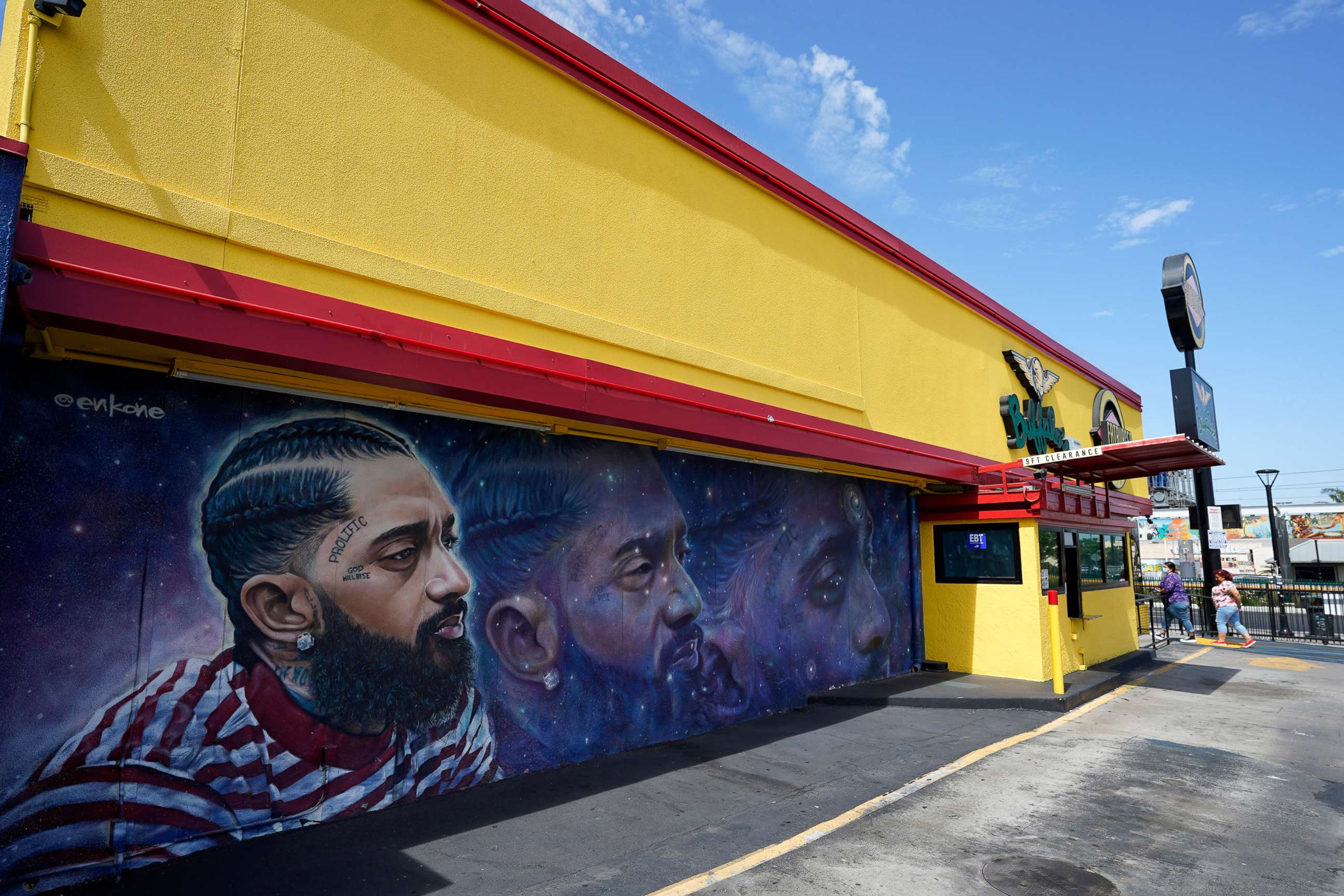 PHOTO: A street mural of the late rapper Nipsey Hussle is pictured near his closed Marathon Clothing store, June 30, 2022, in Los Angeles.