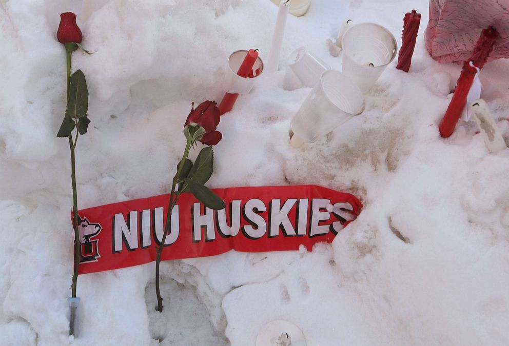  Roses rest in the snow outside the student center on the campus of Northern Illinois University following a shooting at Cole Hall, Feb. 15, 2008, in DeKalb, Ill.					