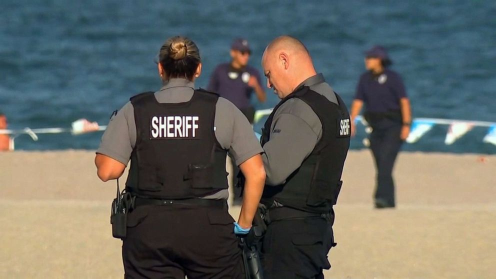 PHOTO: Authorities stand on the beach after a stabbing at Point Pleasant Beach in New Jersey on Sept. 7, 2020.