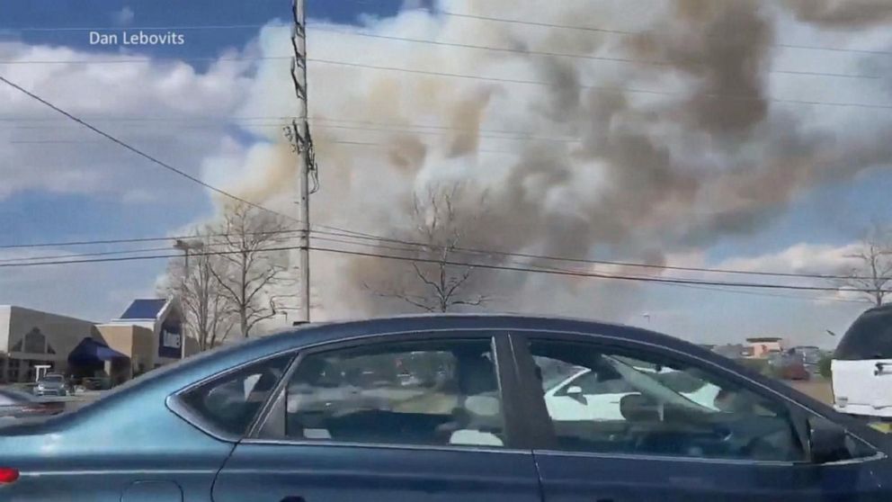 PHOTO: Firefighters in Ocean County, New Jersey work to contain a massive forest fire that burned 170 acres, damaged nearby structures and seriously injured a firefighter on March 14, 2021.