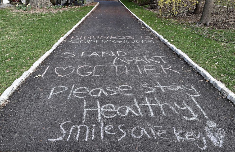 PHOTO: Chalk messages adorn the driveway of Meredith Brehm's home, on March 27, 2020, in Maplewood, New Jersey.