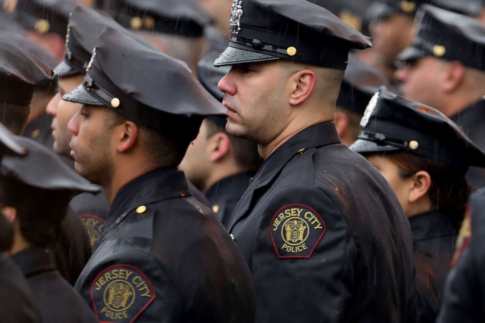 PHOTO: Thousands of police officers gather in the rain for the funeral service for New Jersey Detective Joseph Seals, Dec. 17, 2019, in Jersey City, New Jersey.
