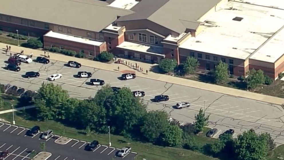 PHOTO: Students stream out of Noblesville West Middle School in Noblesville, Ind., after reports of a shooting, May 25, 2018.