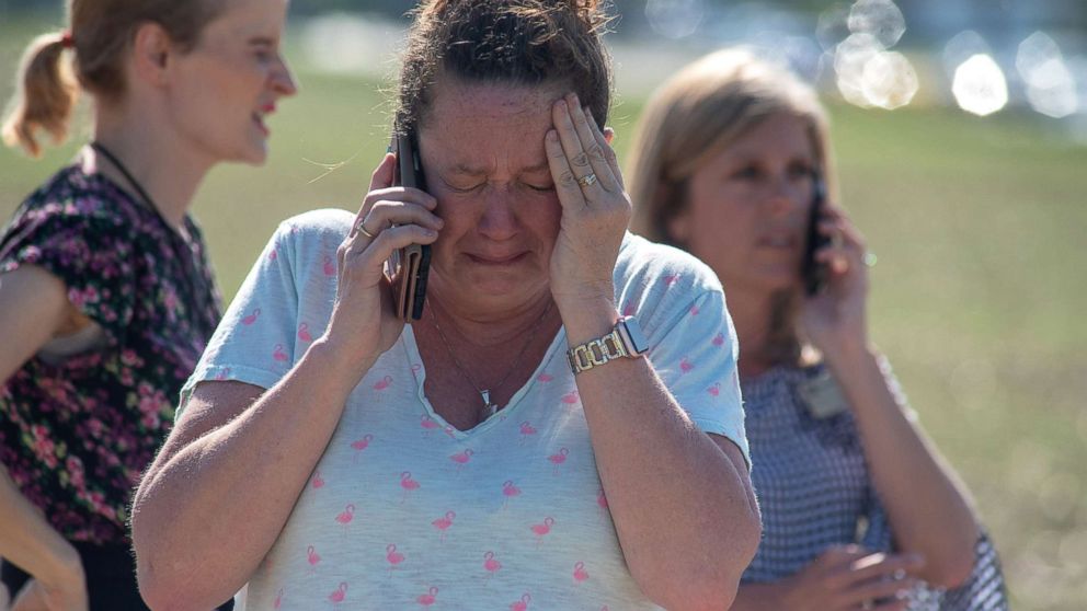 PHOTO: Instructional Assistant Paige Rose reacts outside Noblesville West Middle School after a shooting at the school on May 25, 2018 in Noblesville, Ind.